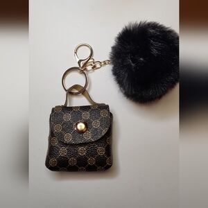 Chic Black and Gold Patterned Key Holder with Pom Pom
